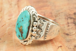 Genuine Royston Turquoise Stone set in Sterling Silver Ring. The Royston Turquoise Mine is located in Nye County, Nevada. Created by Navajo Artist Tony Garcia. Signed by the artist.