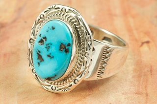 Genuine Sleeping Beauty Turquoise set in Sterling Silver. Created by Navajo Artist kathy Yazzie. Signed by the artist. The Sleeping Beauty Turquoise mine is located in Gila County, Arizona.
