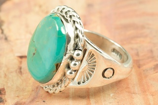 Genuine Royston Turquoise Stone set in Sterling Silver Ring. The Royston Turquoise Mine is located in Nye County, Nevada. Created by Navajo Artist Tony Garcia. Signed by the artist.