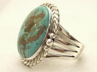 Genuine Blue Ridge Turquoise set in Sterling Silver Ring. Created by Navajo Artist Tony Garcia. Signed. Blue Ridge Turquoise is mined in Lander County, Nevada. 

