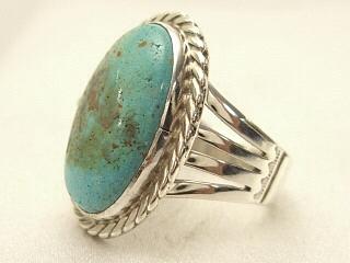 Genuine Blue Ridge Turquoise set in Sterling Silver Ring. Created by Navajo Artist Tony Garcia. Signed. Blue Ridge Turquoise is mined in Lander County, Nevada. 
