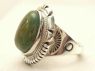 Genuine Blue Gem Turquoise set in Sterling Silver Ring. The Blue Gem Turquoise Mine which is no longer active produced almost every shade of green and blue turquoise. The Blue Gem Mine was located in Nevada near Battle Mountain. Created by Navajo Artist Milton Lee.