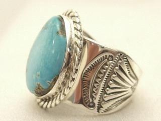 Genuine Turquoise Mountain Mine Stone set in Sterling Silver Ring. Created by Navajo Artist Tony Garcia. Signed. The Turquoise Mountain Mine is located in Mohave County, Arizona. 
