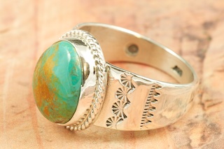Genuine Crow Springs Turquoise set in Sterling Silver Ring. The Crow Springs Mine is located near Tonopah, Nevada. Created by Navajo Artist Phillip Sanchez. Signed by the artist.