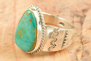 Genuine Crow Springs Turquoise set in Sterling Silver Ring. The Crow Springs Mine is located near Tonopah, Nevada. Created by Navajo Artist Phillip Sanchez. Signed by the artist.