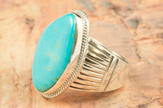 Genuine Royston Turquoise Stone set in Sterling Silver Ring. The Royston Turquoise Mine is located in Nye County, Nevada. Created by Navajo Artist John Nelson. Signed by the artist.