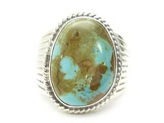 Genuine Crow Springs Turquoise set in Sterling Silver Ring. The Crow Springs Mine is located near Tonopah, Nevada. Created by Navajo Artist Phillip Sanchez. Signed.