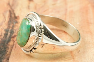 Genuine Royston Turquoise Stone set in Sterling Silver Ring. The Royston Turquoise Mine is located in Nye County, Nevada. Created by Navajo Artist Freddy Charlie. Signed by the artist.