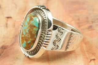 Genuine Pilot Mountain Turquoise set in Sterling Silver Ring. The Pilot Mountain Mine is located in Esmeralda County, Nevada. Created by Navajo Artist Phillip Sanchez. Signed by the artist.