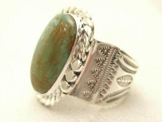 Genuine Crow Springs Turquoise set in Sterling Silver Ring. The Crow Springs Mine is located near Tonopah, Nevada. Created by Navajo Artist Phillip Sanchez. Signed.
