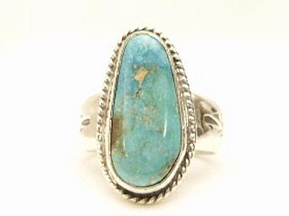 Genuine Royston Turquoise Stone set in Sterling Silver Ring. The Royston Turquoise Mine is located in Nye County, Nevada. Created by Navajo Artist Thomas Chischilly. 
