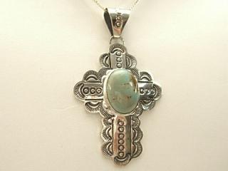 Genuine Sleeping Beauty Turquoise set in Sterling Silver Cross Pendant. FREE 18" Sterling Silver Chain with Purchase of Pendant. Created by Navajo Artist Harry Spencer. Signed.