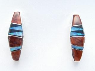 Genuine Spiny Oyster Shell and Black Jade inlaid between ribbons of Sterling Silver Post Earrings. Beautiful Fire and Ice Lab Opal Accents. Designed by Navajo Artist Calvin Begay. Signed. 
