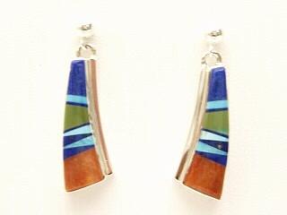 Genuine Sleeping Beauty Turquoise, Spiny Oyster Shell, Sugilite and Blue Lapis inlaid between ribbons of Sterling Silver. Stunning Half Hoop Post Earrings with precision channel inlay. Created by Navajo Artist Calvin Begay.