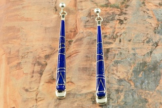 Genuine Turquoise, Spiny Oyster Shell, Sugilite and Black Jade inlaid in Sterling Silver Post Earrings. Beautiful Fire and Ice Lab Opal Accents. Designed by Navajo Artist Calvin Begay. Signed. 

