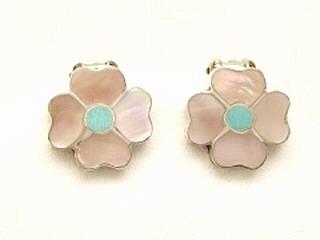 Genuine Mother of Pearl and Sleeping Beauty Turquoise inlaid in Sterling Silver Clip on Earrings. Created by a member of the Zuni Tribe. The Zuni Pueblo is located in New Mexico.