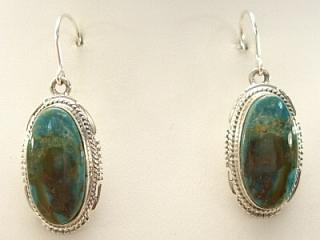 Genuine Emerald Valley Turquoise set in Sterling Silver French Wire Earrings. The Emerald Valley Mine is located in Nevada. Created by Navajo Artist Larson Lee. 
