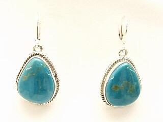 Genuine Crow Springs Turquoise set in Sterling Silver French Wire Earrings. The Crow Springs Mine is located near Tonopah, Nevada. Created by Navajo Artist Lucy Valencia.
