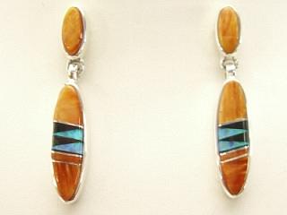 Genuine Spiny Oyster Shell and Black Jade inlaid in Sterling Silver Post Earrings. Beautiful Fire and Ice Lab Opal Accents. Designed by Navajo Artist Calvin Begay. Signed.
