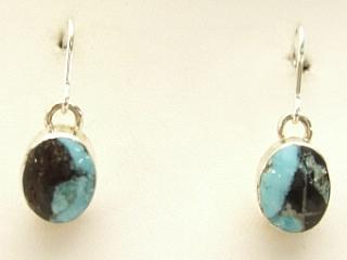 Genuine Blue Diamond Turquoise set in Sterling Silver French Wire Earrings. The Blue Diamond mine, located in central Nevada, opened in the late 1950�s and was mined up to 1980. This mine is considered a �hat mine� of which there are very few. A hat mine is a small deposit of turquoise that, �you can cover with your hat.� This mine is now closed and buried under thousands of tons of rock. Created by Navajo Artist Flora Willeto. Signed.