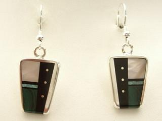 Genuine Mother of Pearl, Turquoise and Jet inlaid in Sterling Silver French Wire Earrings. Created by Navajo Artist Jimmy Poyer. Signed. Jimmy Poyer is a Navajo Indian who lives in the Four Corners. He uses all natural materials in hs jewelry designs. He hopes you enjoy this creation. 
