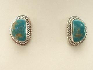 Genuine Crow Springs Turquoise set in Sterling Silver Post Earrings. The Crow Springs Mine is located near Tonopah, Nevada. Created by Navajo Artist Lucy Valencia. Signed. 
