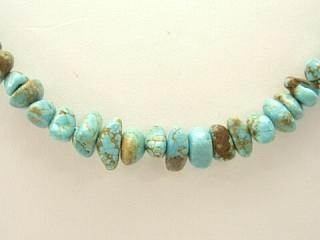 Authentic Native American Jewelry. Stunning Turquoise Necklace with 5 Strands of Genuine Turquoise. Sterling Silver Cones, Extender and Clasp. Created by Zuni Artist Sara Leekya.
