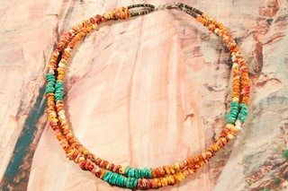 Beautiful 2 Strand Necklace featuring Genuine Turquoise and Spiny Oyster Shell. Sterling Silver Clasp. Created by Santo Domingo Artist Carol Pacheco. The Santo Domingo Pueblo is in New Mexico, near Santa Fe. 
