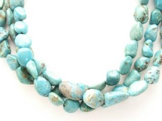 Authentic Native American Jewelry. Genuine Turquoise set in Sterling Silver Pendant. This outstanding Pendant is on a Beautiful Genuine Genuine Turquoise Necklace with Accents of Spiny Oyster Shell. Sterling Silver Cones, Clasp and Extender. Created by Zuni Artist Leonard Mitza. Signed.