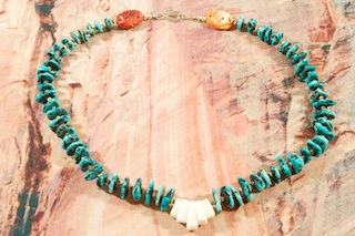 Beautiful Necklace featuring Genuine Kingman Turquoise and Penshell Heishi. Mother of Pearl and Spiny Oyster Shell Accents. Sterling Silver Beads and Clasp.  Created by Santo Domingo Artist Carol Pacheco. The Santo Domingo Pueblo is in New Mexico, near Santa Fe. 