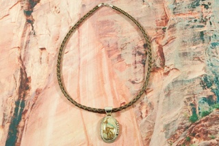 Genuine Boulder Turquoise set in Sterling Silver Pendant, on a Genuine Turquoise and Picture Jasper Necklace. Sterling Silver Beads, Clasp and Extender. The cabochon is Boulder Turquoise, you can see the veins of Turquoise running through the host rock. The Boulder Turquoise Mine is located in northeast Nevada. It was discovered in 1970 by a Shoshone sheep herder. Production is small due to the remote location and winter weather. Boulder Turquoise is valued for both it's beauty and rarity. Every stone is unique. This Beautiful Pendant and Necklace Set is a one of a kind Set. The photo is of the jewelry you will be receiving. Created by Navajo Artist Phillip Sanchez. Signed. 