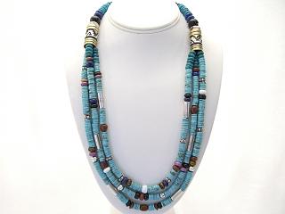 Authentic Native American Jewelry 3 Strand Genuine Turquoise Necklace with Sterling Silver Barrels & Clasp. Featuring Beatuiful Blue Lapis, Black Onyx, Spiny Oyster Shell, Howlite and Jasper. Created by Navajo Artist Tommy Singer. Signed.