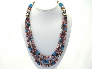 Authentic Native American Jewelry Genuine Spiny Oyster Shell with Accents of Genuine Turquoise, Black Onyx and Jasper. Necklace features Sterling Silver Beads and Clasp.Sterling Silver Clasp. Created by Navajo Artist Tommy Singer. Signed T. Singer.