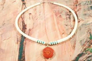 Stunning 5 Strand Necklace featuring Genuine Kingman Turquoise and Penshell Heishi. The Kingman Turquoise Mine is located in Mohave County, Arizona. Created by Santo Domingo Artist Carol Pacheco. The Santo Domingo Pueblo is in New Mexico, near Santa Fe. 
