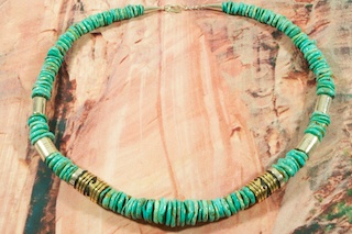 Genuine Assorted Gemstones Necklace with Sterling Silver and Gold Filled Barrels. Featuring Genuine Turquoise, Denim Lapis, Picture Jasper, and Black Onyx. Sterling Silver Clasp. The photo is of the necklace you will be receiving. Stunning Necklace Created by Navajo Artist Tommy Singer.