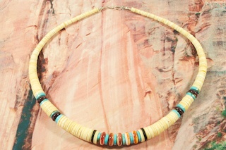 Genuine Sleeping Beauty Turquoise Necklace with a Beautiful Leaf Design Pendant. Sterling Silver Beads and Clasp. Created by Santo Domingo Artist Carol Pacheco. The Santo Domingo Pueblo is in New Mexico, near Santa Fe. The pattern on the leaf may vary.