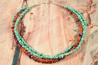 Genuine Kingman Turquoise Necklace with Sterling Silver Beads and Clasp. The Kingman Turquoise Mine is located in Mohave County, Arizona. Created by Santo Domingo Artist Carol Pacheco. The Santo Domingo Pueblo is in New Mexico, near Santa Fe.
