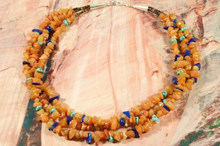 Stunning Necklace featuring Genuine Kingman Turquoise and Picture Jasper. The Kingman Turquoise Mine is located in Mohave County, Arizona. Created by Santo Domingo Artist Carol Pacheco. The Santo Domingo Pueblo is in New Mexico, near Santa Fe. 
