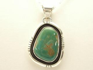 Authentic Native American Jewelry. Genuine Apple Coral set in Sterling Silver Pendant. Free 18