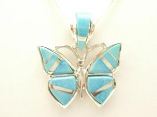 Genuine Sleeping Beauty Turquoise inlaid between ribbons of Sterling Silver. Beautiful Butterfly Pendant with precision inlay on the Bale and Pendant. Free 18