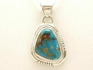 Genuine Turquoise Mountain Mine Turquoise set in Sterling Silver Pendant. The Turquoise Mountain Mine is located in the Mineral Park Mining District, Mohave County, Arizona. Although Turquoise Mountain is located near the Kingman Turquoise Mine it is considered a classic mine in its own right because the Turquoise is so different in appearance. It is also known as 