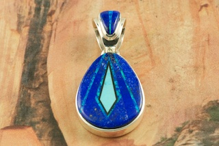 Beautiful Pendant featuring Genuine Blue Lapis, Turquoise and Black Jade inlaid in Sterling Silver. Accented with Fire and Ice Lab Opals.  Free 18