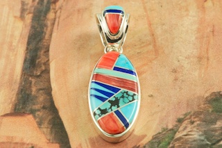 Genuine Spiny Oyster Shell, Turquoise and Blue Lapis inlaid between ribbons of Sterling Silver. Precision inlay on the bale and pendant. Free 18