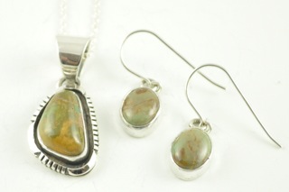 Beautiful Dry Creek Turquoise set in Sterling Silver. Pendant and Earring set with Free 18