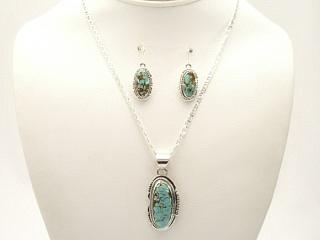 Genuine Number 8 Mine Turquoise Stones set in Sterling Silver. 18" Sterling Silver Chain is included. This Beautiful Pendant and Earring Set is a one of a kind Set. The photo is of the jewelry you will be receiving. Created by Navajo Artists John Nelson and Arkie Nelson. Signed. The Number 8 mine is located in Eureka County Nevada. Since 1976 there has been no Number 8 Turquoise mined. There is however, an existing stock pile that Mr. Dowell Ward, the last owner of the Number 8 mine, had stocked away for later sorting. The Turquoise is a collector's item--because once the reserve is gone there will be no more material released onto the market. The Gold Mining Company owns the claim to the Number 8 mine and it has been swallowed up by the gold mining operations. This is some of the last Number 8 Turquoise to be had and will be a great addition to your collection. 