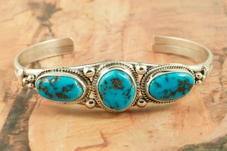 Genuine Sleeping Beauty Turquoise set in Sterling Silver Bracelet. The Sleeping Beauty Turquoise mine is located in Gila County, Arizona. Created by Navajo Artist Lucy Valencia. Signed by the artist.