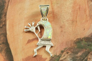 Stunning Kokopelli Pendant featuring Fire and Ice Lab Opals inlaid in Sterling Silver. Precision inlay on the bale and the pendant. Free 18