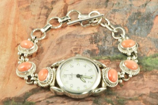 Genuine Coral set in Sterling Silver Quartz Watch Bracelet. Created by Navajo Artist Tony Garcia.