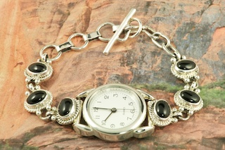 Genuine Black Onyx set in Sterling Silver Quartz Watch Bracelet. Created by Navajo Artist Tony Garcia.