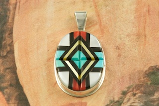 Beautiful Zuni Pendant featuring Genuine Turquoise, Red Coral, Mother of Pearl and Jet inlaid in Sterling Silver. Created by Zuni Artist Yelmo Natachu. Signed by the artist. Free 18